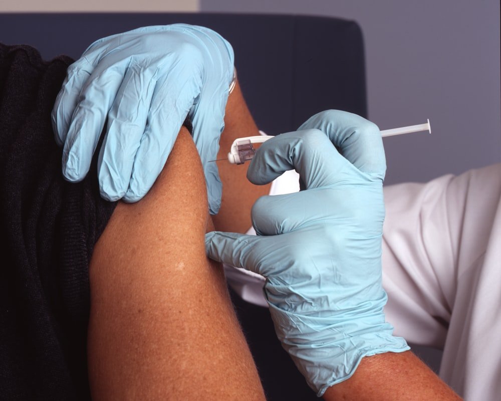Provider giving a patient hands-on care during an office visit